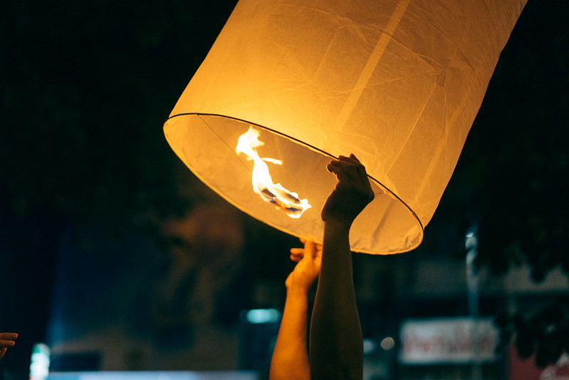 floating paper lantern with fire