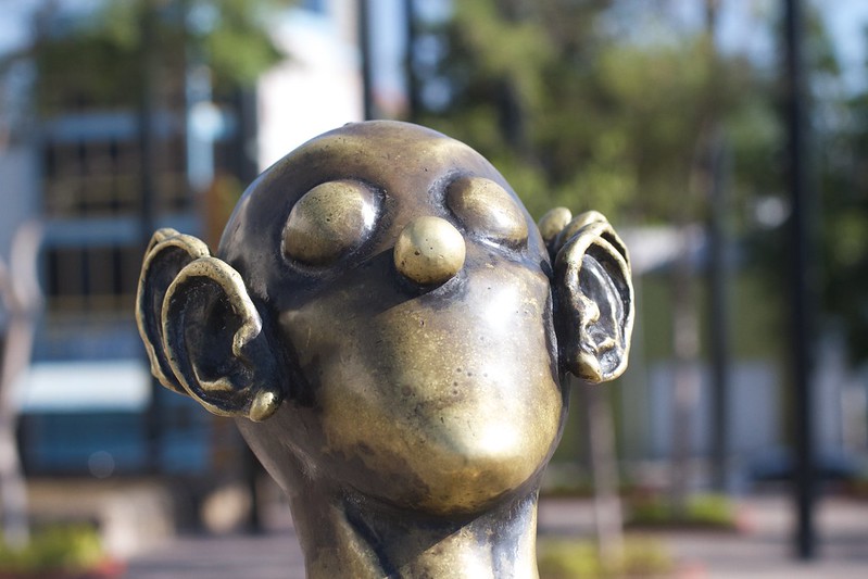 public sculpture with no mouth