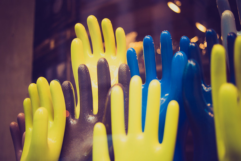 rubber gloves displayed standing up
