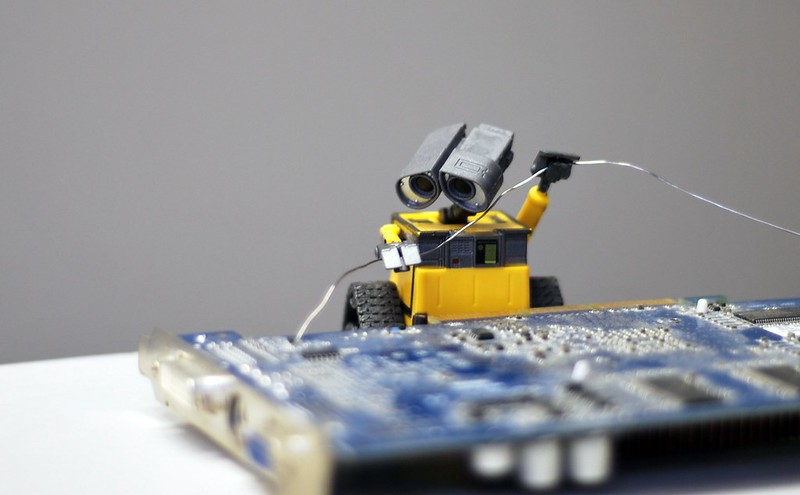 wall-e soldering a computer part