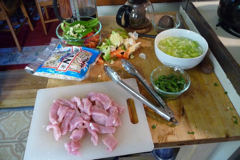 chow mein mise en place -- bowls of ingredients on a chopping board