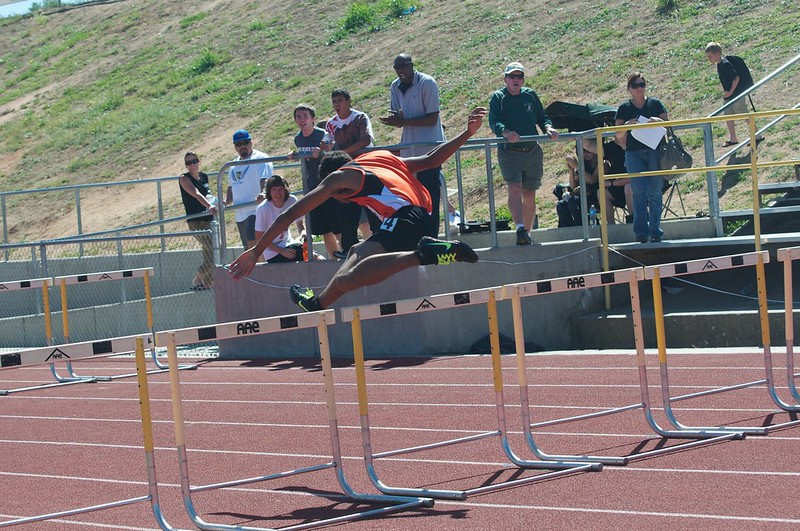 racer clearing a hurdle 