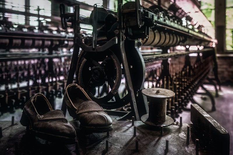 old worker shoes found in a factory that closed in 1958
