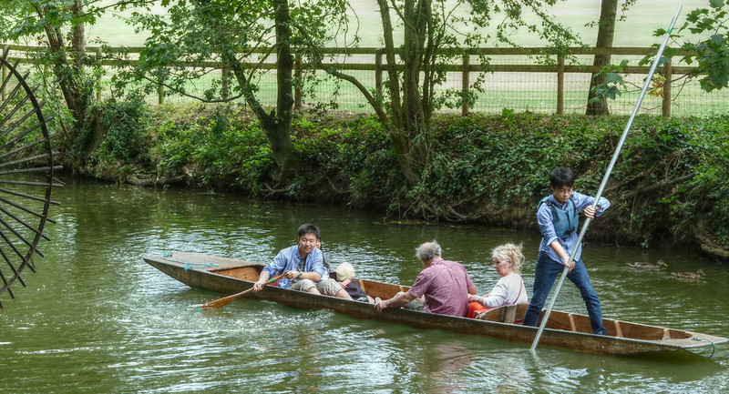 four people on a punt going the wrong way