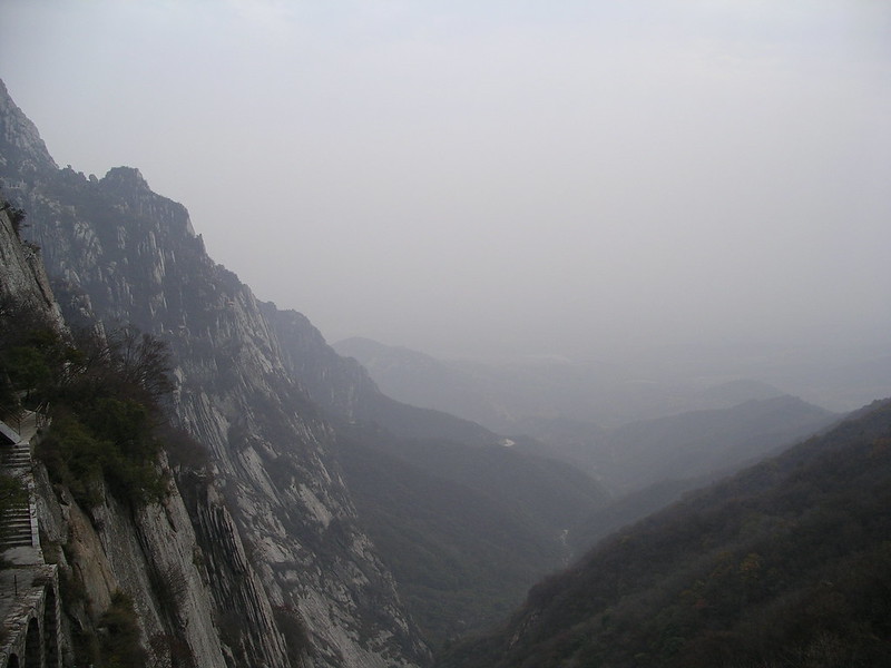 deep valleys and high mountains shrouded in fog