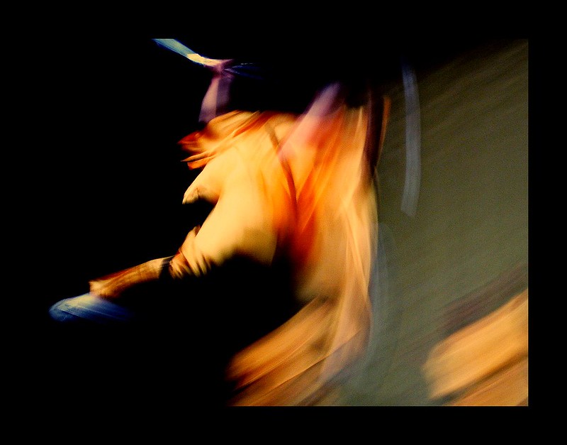 blurred image of a monk doing a kung fu performance